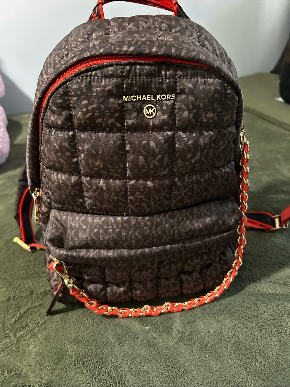 Michael Kors Brown Quilted Logo Mini Backpack with orange Trim